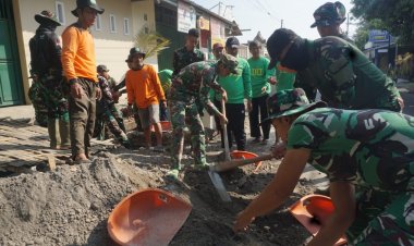 Semangat TMMD Kodim 0735 Surakarta Tak Luntur di Tengah Cuaca Ekstrem